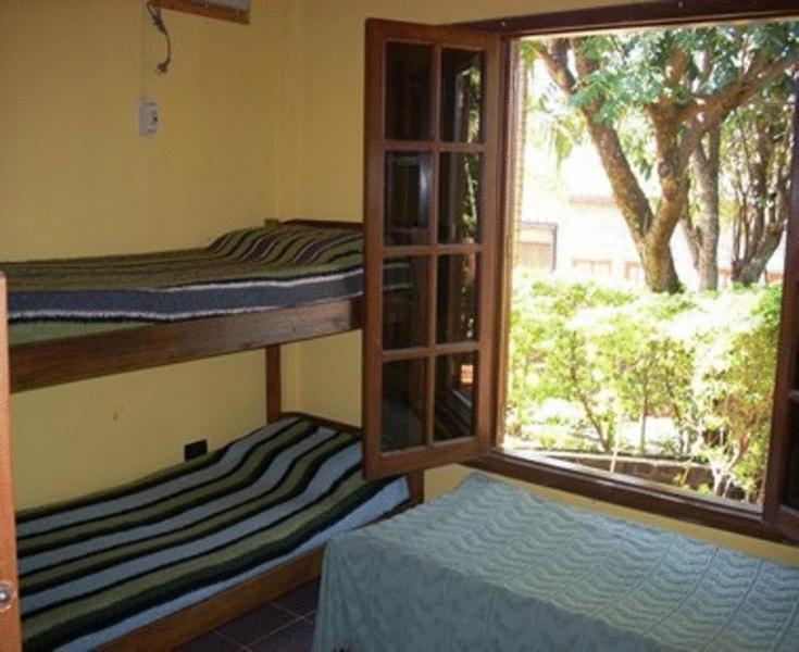 El Guembe Hostel House ปูแอร์โตอีกวาซู ห้อง รูปภาพ
